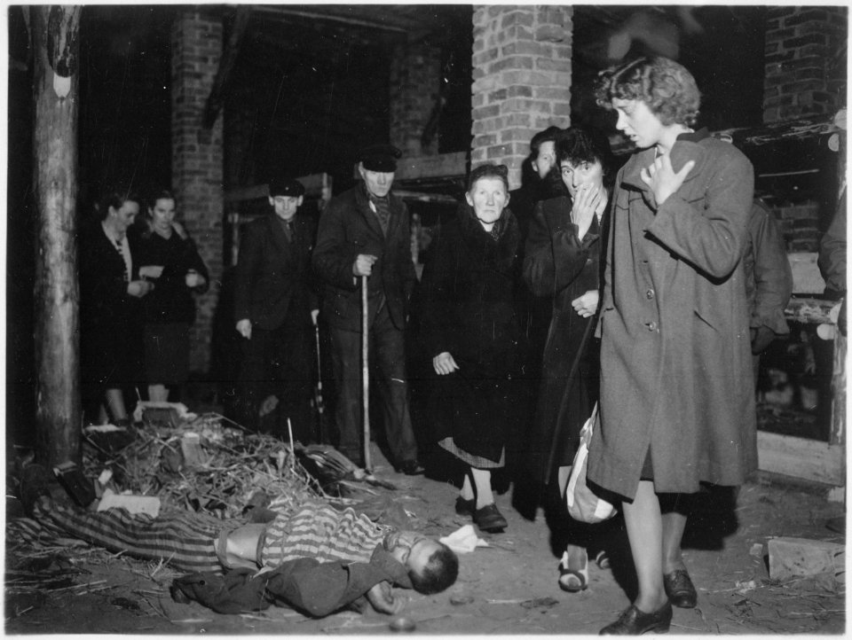Citizens of Ludwigslust, Germany, inspect a nearby concentration camp under orders of the 82nd Airborne Division.... - NARA - 531297