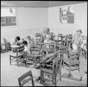 Closing of the Jerome Relocation Center, Denson, Arkansas. A recruited crew of Jerome evacuees remo . . . - NARA - 539778
