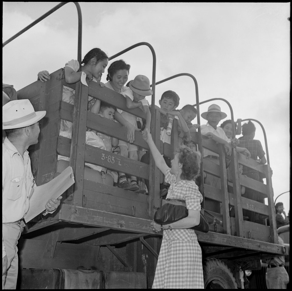 Closing of the Jerome Relocation Center, Denson, Arkansas. A teacher in the Jerome school bids good . . . - NARA - 539757