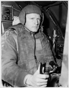 CLAD IN HIS ARMOR. Normally a good-sized man, Captain Melvin E. Jarvis, 1318 Roberta Street, Salt Lake City, Utah... - NARA - 542352 photo