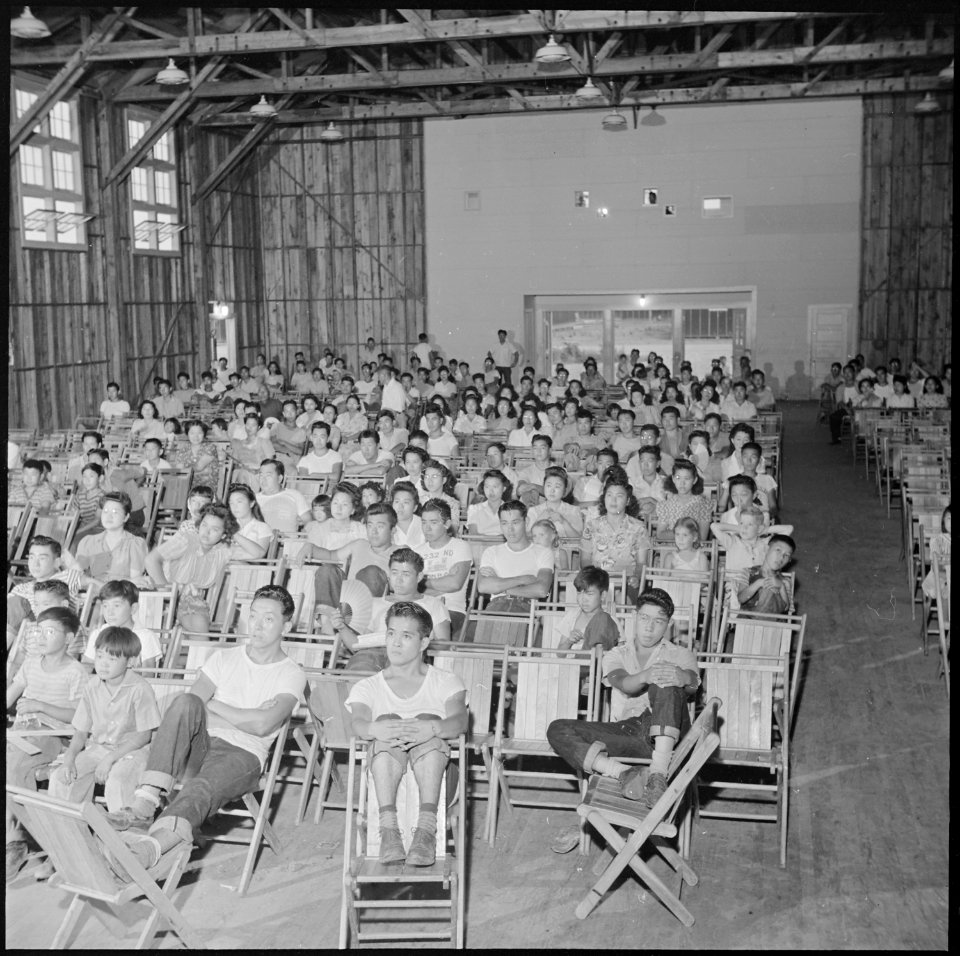 Closing of the Jerome Relocation Center, Denson, Arkansas. A view of the audience in the large, rec . . . - NARA - 539786