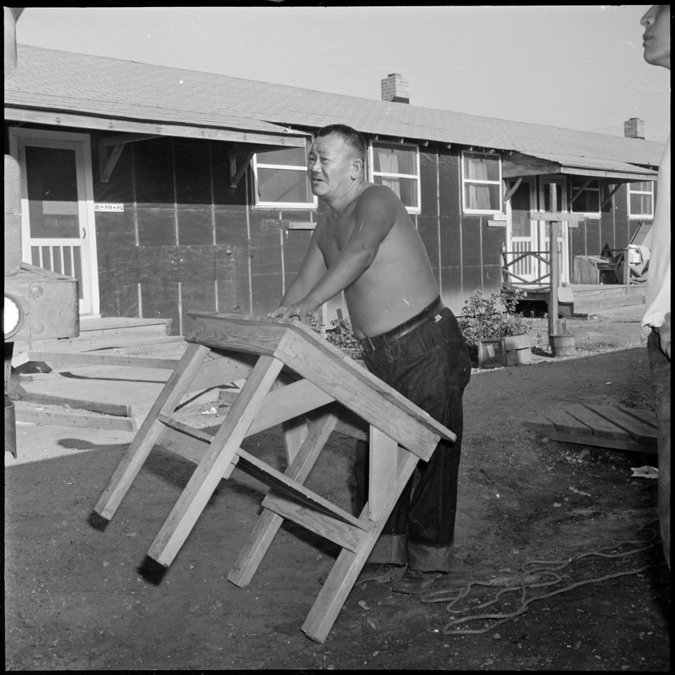 Closing of the Jerome Relocation Center, Denson, Arkansas. Everybody helped in the loading of their . . . - NARA - 539765