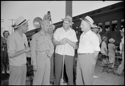 Closing of the Jerome Relocation Center, Denson, Arkansas. Left to right, R. A. Walling, Transporta . . . - NARA - 539750