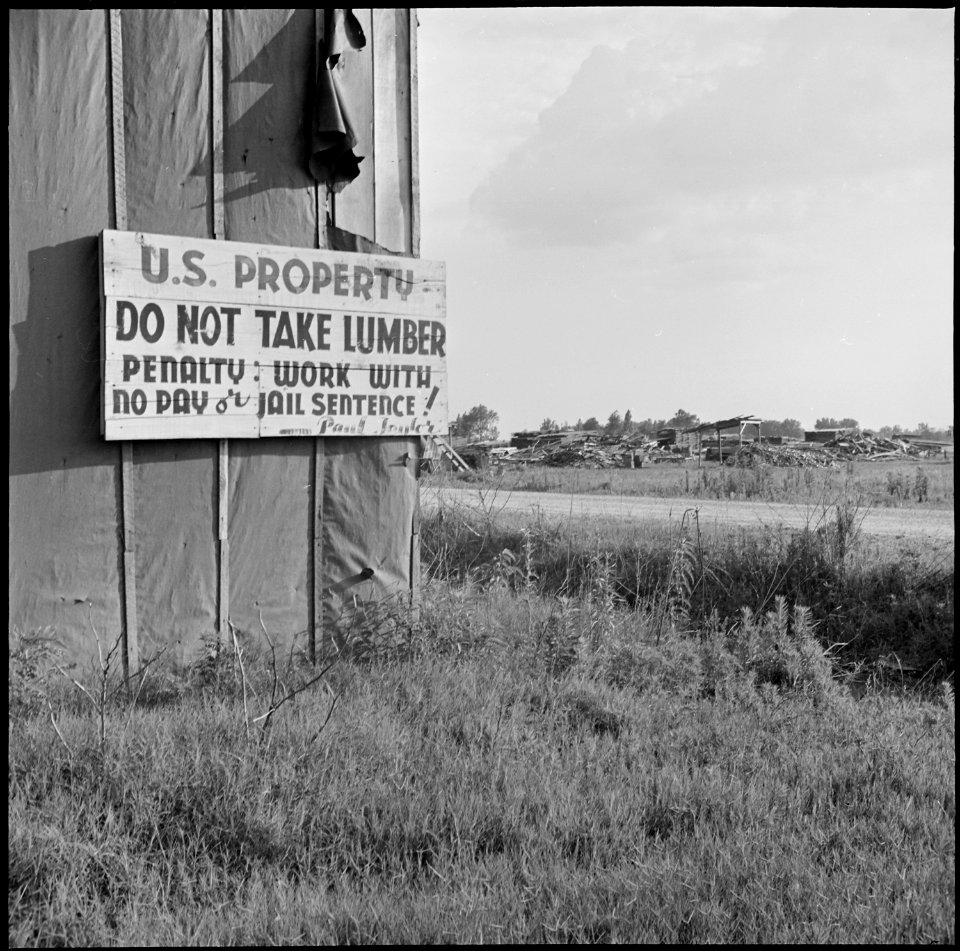 Closing of the Jerome Relocation Center, Denson, Arkansas. Old sign at the Jerome Center's lumber yard. - NARA - 539740