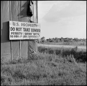 Closing of the Jerome Relocation Center, Denson, Arkansas. Old sign at the Jerome Center's lumber yard. - NARA - 539740