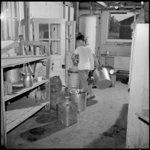 Closing of the Jerome Relocation Center, Denson, Arkansas. Dismantling one of Jerome's thirty-three . . . - NARA - 539734