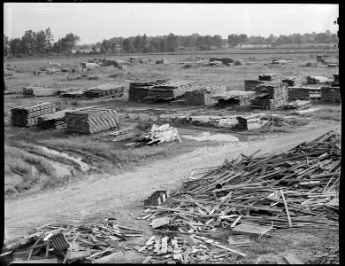 Closing of the Jerome Relocation Center, Denson, Arkansas. The Jerome Center lumber yard. Much of . . . - NARA - 539685