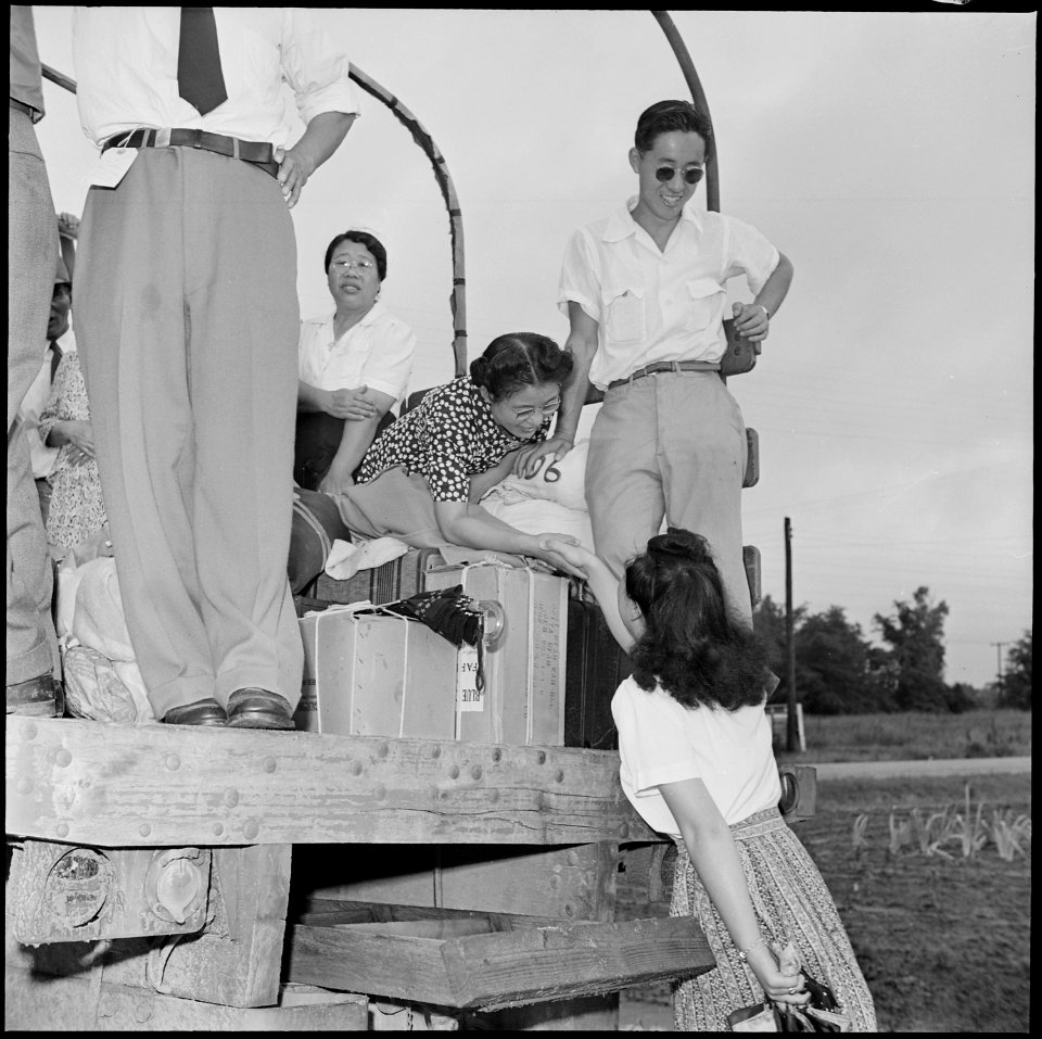 Closing of the Jerome Relocation Center, Denson, Arkansas. One of the 500 Jerome residents waiting . . . - NARA - 539761