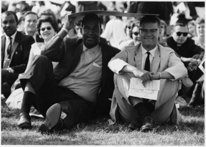 Civil Rights March on Washington, D.C. (Marchers sitting on the grass.) - NARA - 542009 photo