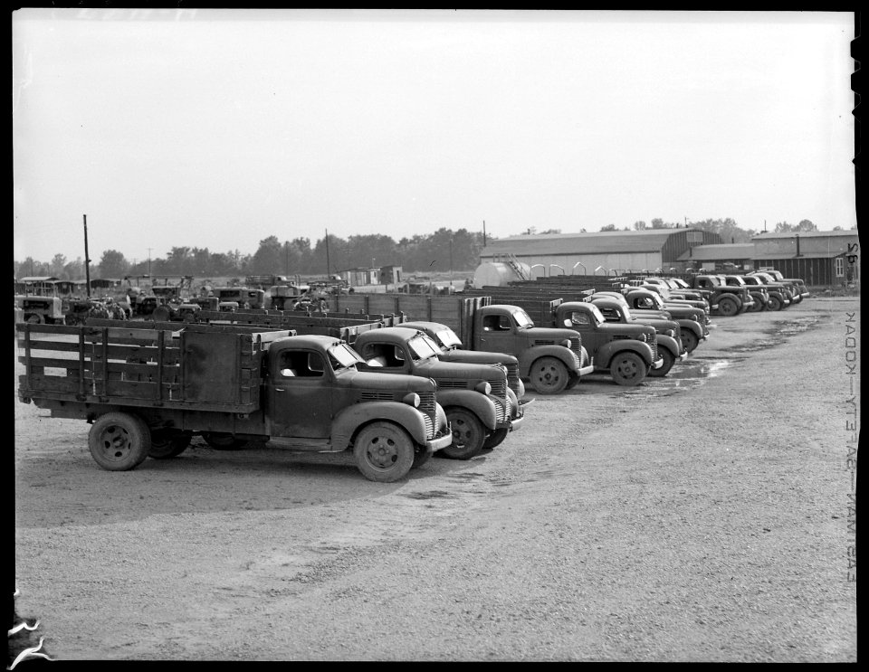 Closing of the Jerome Relocation Center, Denson, Arkansas. View in the Jerome motor pool showing tr . . . - NARA - 539700
