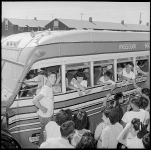 Closing of the Jerome Relocation Center, Denson, Arkansas. Scene as one of the buses departed carry . . . - NARA - 539791
