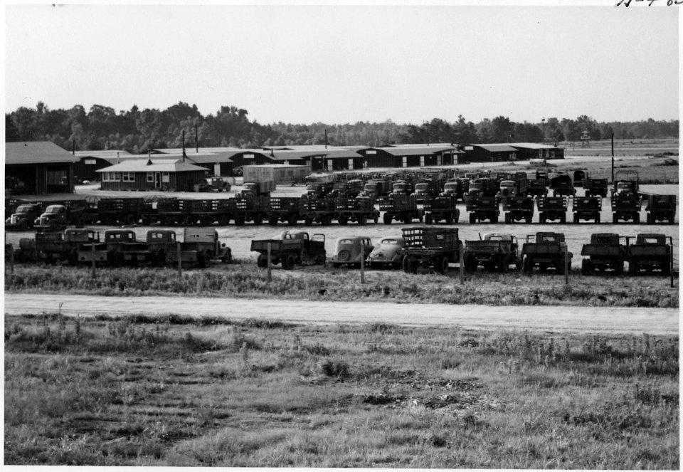 Closing of the Jerome Relocation Center, Denson, Arkansas. The Jerome Center motor pool showing veh . . . - NARA - 539698