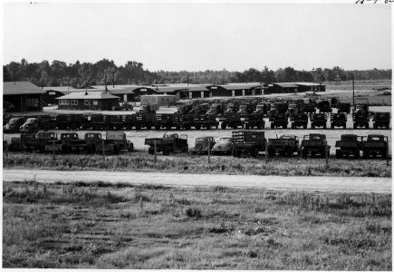 Closing of the Jerome Relocation Center, Denson, Arkansas. The Jerome Center motor pool showing veh . . . - NARA - 539698
