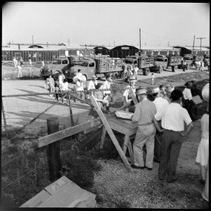 Closing of the Jerome Relocation Center, Denson, Arkansas. War Relocation Authority official and tr . . . - NARA - 539655