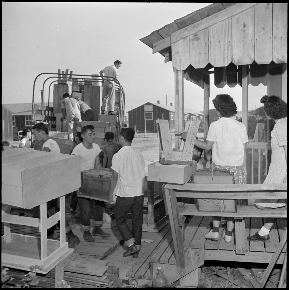 Closing of the Jerome Relocation Center, Denson, Arkansas. Scene in one of the block streets as tra . . . - NARA - 539759