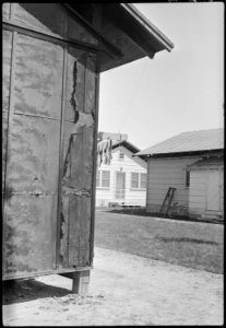 Colorado River Relocation Center, Poston, Arizona. Corner of Barrack G in Block 34, where appointed . . . - NARA - 537285
