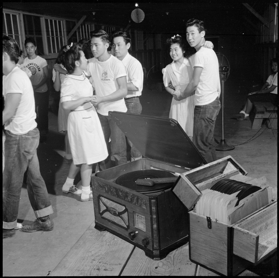 Closing of the Jerome Relocation Center, Denson, Arkansas. Young folks enjoy a final dance in one o . . . - NARA - 539763