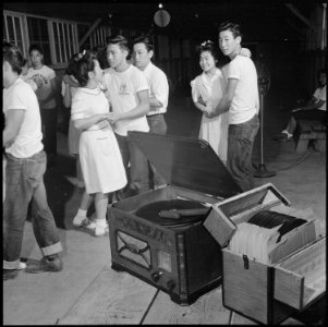 Closing of the Jerome Relocation Center, Denson, Arkansas. Young folks enjoy a final dance in one o . . . - NARA - 539763