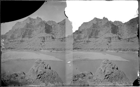 Colorado River. Cliffs opposite the mouth of the Little Colorado (river has a large sandbar on island in it). Old... - NARA - 517969 photo