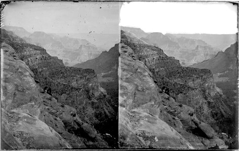 Colorado River. Grand Canyon near Toroweap^ or Muav. A man is shown left center of photo sitting on a canyon ledge... - NARA - 518028
