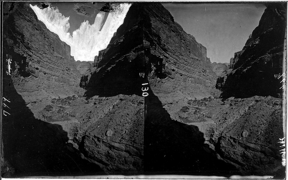 Colorado River. Cataract Canyon, side canyon. The very small figure of a man is in the middle foreground above the... - NARA - 517967