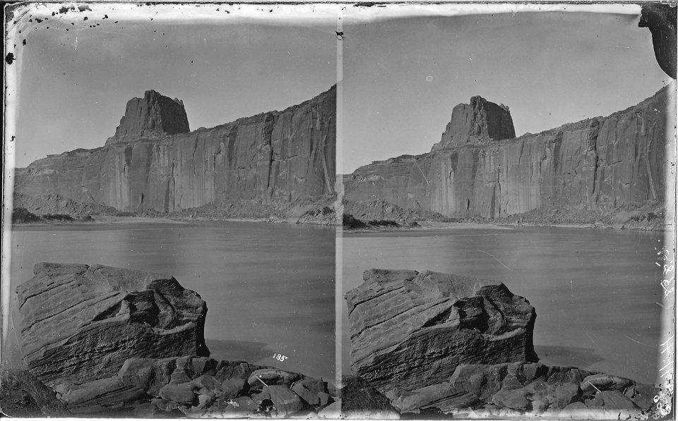 Colorado River. Glen Canyon, unusual butte on top of upper bank and large boulder against bank in the foreground. Old... - NARA - 518006