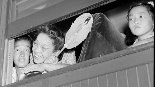 Closing of the Jerome Relocation Center, Denson, Arkansas. Many fans were in evidence in the stuffy . . . - NARA - 539755 (cropped)