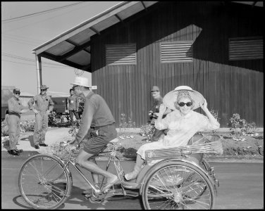 Comedienne Phyllis Diller smiles for the camera as the Bob Hope Christmas show arrives at Korat Air Base, Thailand... - NARA - 542302