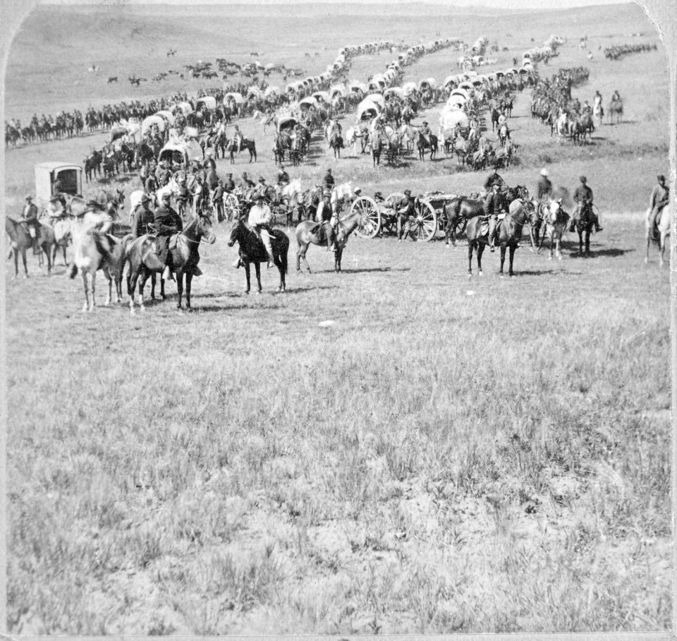 Column of cavalry, artillery, and wagons, commanded by Gen. George A. Custer, crossing the plains of Dakota Territory. B - NARA - 519427