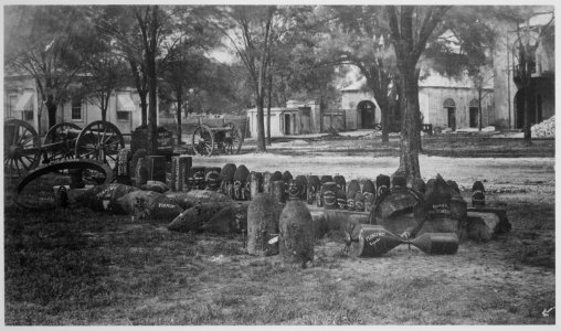 Confederate torpedoes, shot, and shells in front of the arsenal, Charleston, South Carolina, 1865 - NARA - 533134 photo