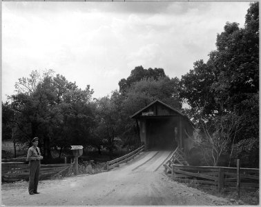 Coosa Valley, Alabama. Covered bridge entrance to reservation - Childersburg. - NARA - 522654