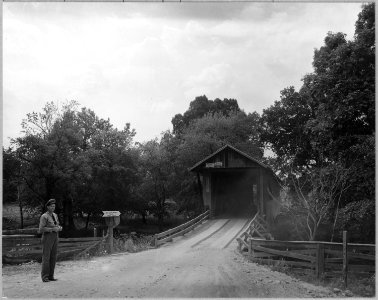 Coosa Valley, Alabama. Covered bridge entrance to reservation - Childersburg. - NARA - 522654