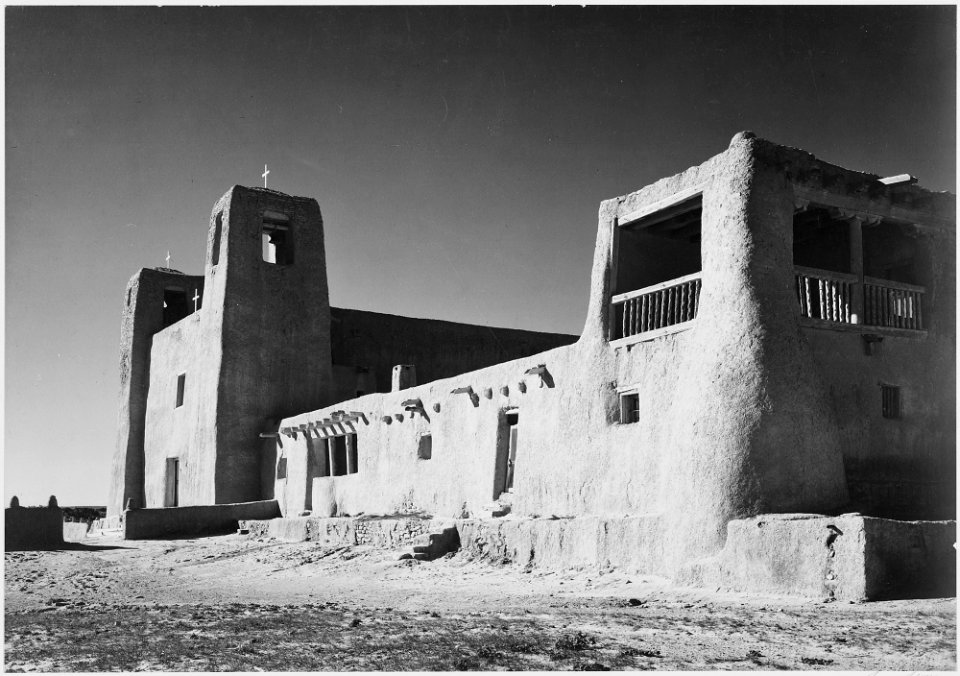 Corner view showing mostly left wall, Church, Acoma Pueblo (National Historic Landmark, New Mexico). (Misicn de San Es - NARA - 519833