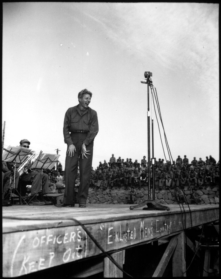 Danny Kaye, well known stage and screen star, entertains 4,000 5th Marine Division occupation troops at Sasebo... - NARA - 532566