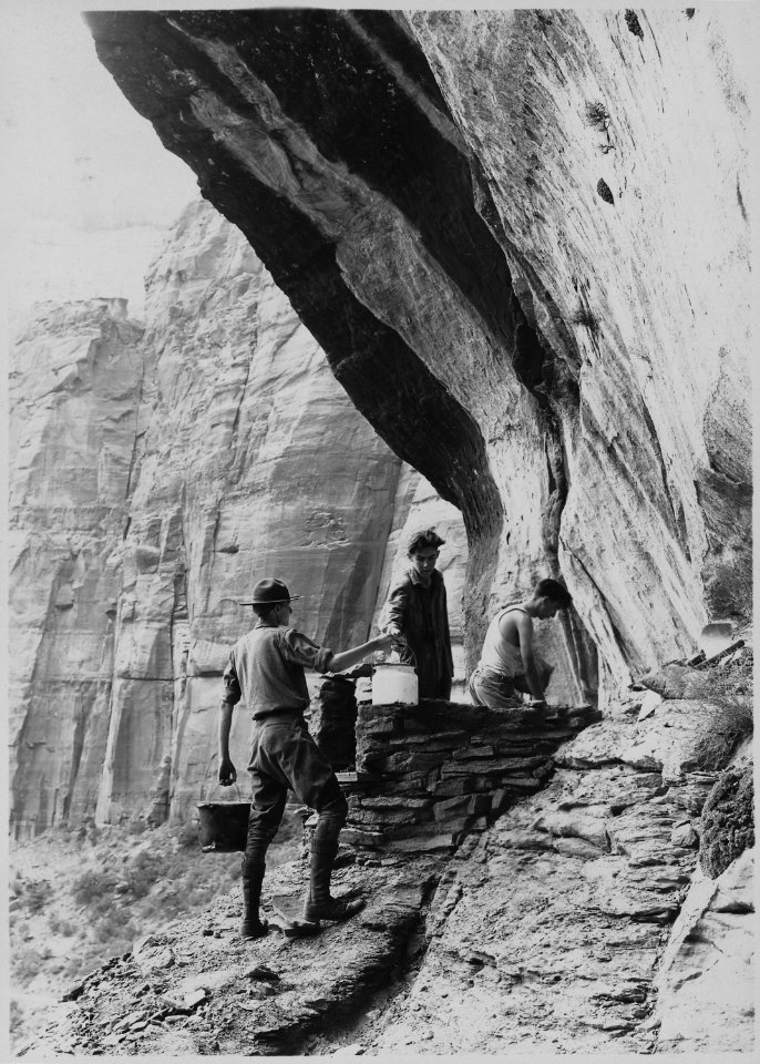 Donald Kelley, Jack Edgemond, and Drew Chick, three of Mr. Hall's scouts, reconstructing prehistoric Indian Granary. - NARA - 520570