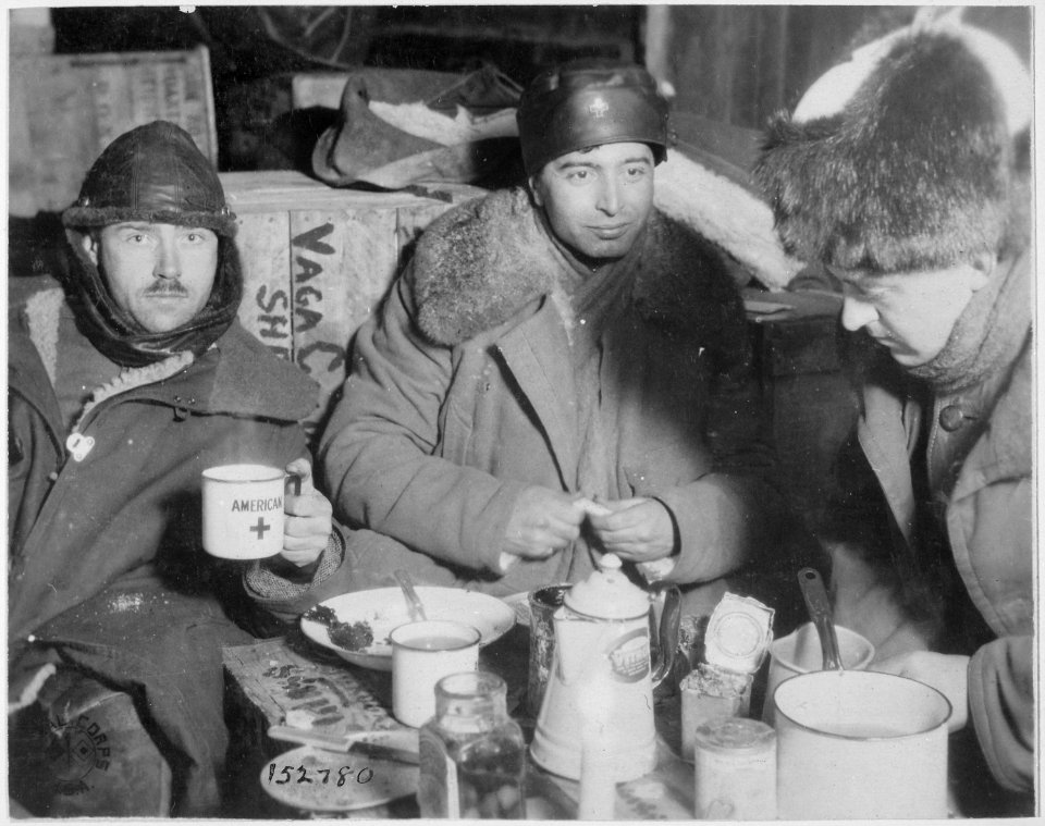 Dinner served in a box car on the Vologia railroad carrying the Red Cross gifts to Americans at the front. The thermomet - NARA - 531145