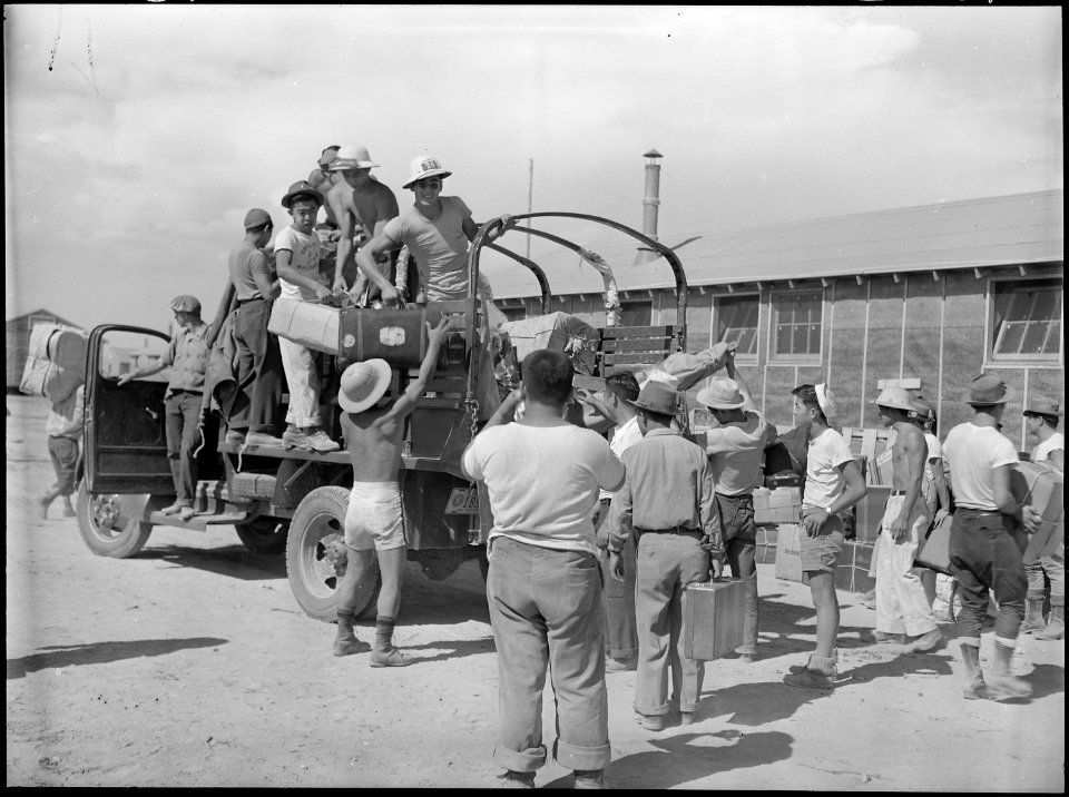 Eden, Idaho. Baggage, belonging to evacuees from the assembly center at Puyallup, Washington, is so . . . - NARA - 538280