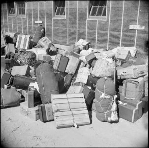 Eden, Idaho. Baggage, belonging to the evacuees from the assembly center at Puyallup, Washington, i . . . - NARA - 538276