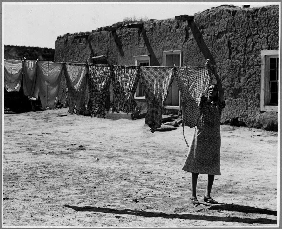 El Cerrito, San Miguel County, New Mexico. Washday. The house in the background is of the old type. - NARA - 521188