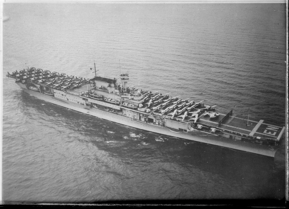 Enterprise (CV6). Aerial, starboard bow, underway, aircraft on deck - NARA - 520811