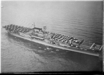 Enterprise (CV6). Aerial, starboard bow, underway, aircraft on deck - NARA - 520811