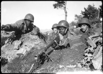 Fighting with the 2nd Infantry Division north of the Chongchon River, Sergeant First Class Major Cleveland, weapons... - NARA - 531389