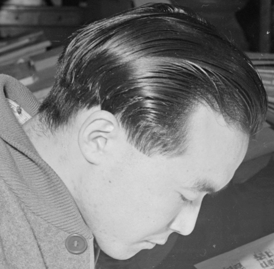 Face detail (right), Heart Mountain Relocation Center, Heart Mountain, Wyoming. A young artists in the Poster Shop at th . . . - NARA - 539151 (cropped)
