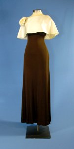 First Lady Betty Ford's brown gown with ivory cape photo