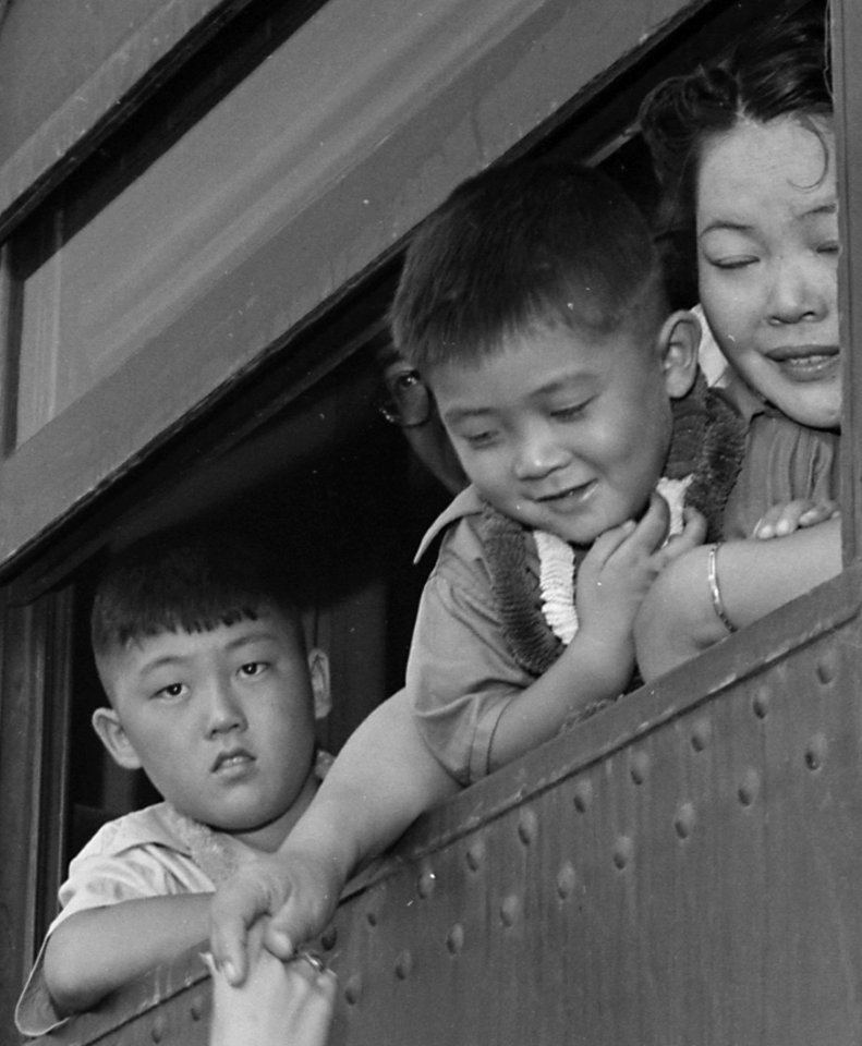 Face detail, Closing of the Jerome Relocation Center, Denson, Arkansas. Fairwell hand clasps as the train bearin . . . - NARA - 539762 (cropped)