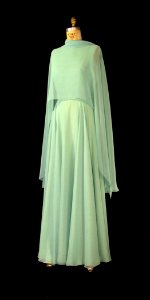 First Lady Betty Ford's green chiffon gown with cape photo