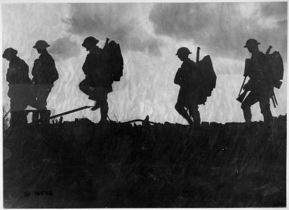 Fresh troops moving up to advanced position, France. Yorkshire regiment advancing at dusk. International Film... - NARA - 530733