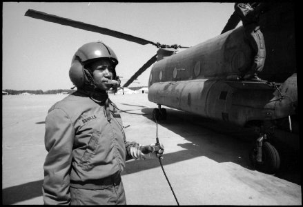 Fort Stewart, Georgia. Female Crew Chief. SP4 Debbie Bonillia, 132d Avn Company, is a Crew Chief for the Army CH47... - NARA - 531468