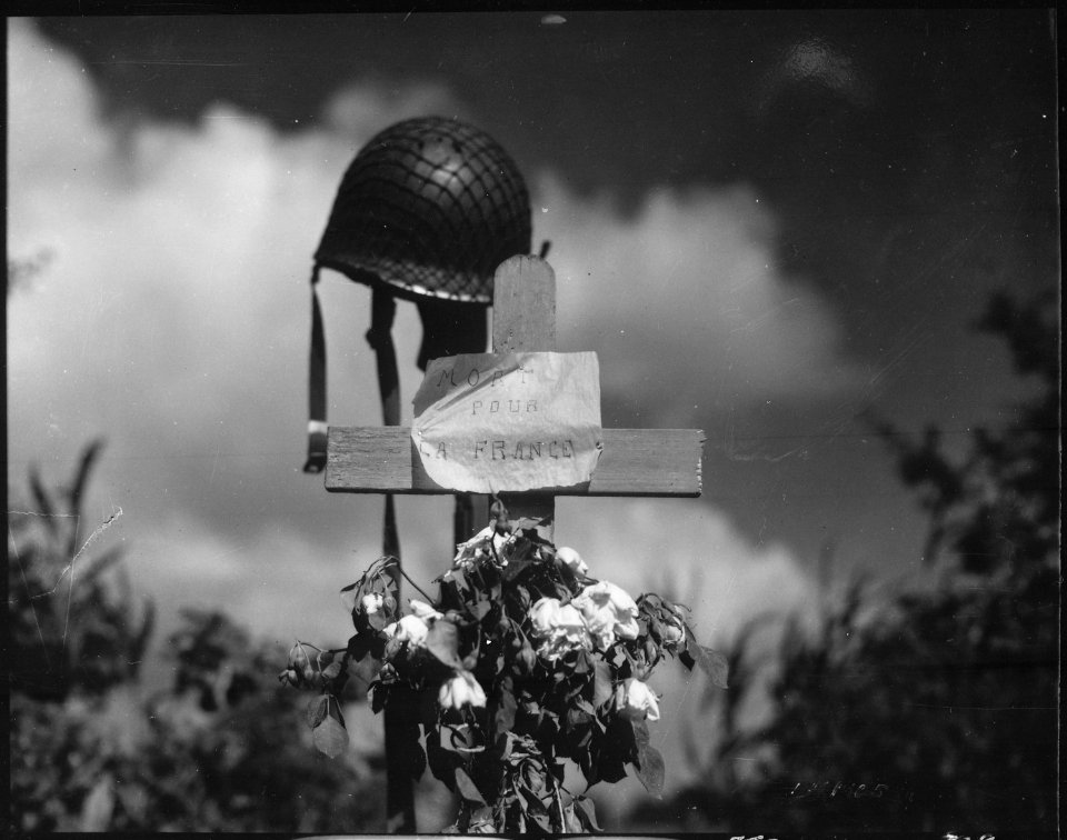 French civilians erected this silent tribute to an American solider who has fallen in the crusade to liberate France... - NARA - 531191