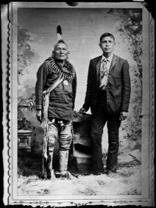 Full length portrait of Indian and white man - NARA - 523715